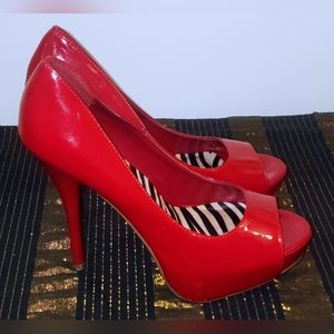 Speed Limit 98 size9 Red Patent Leather Peep Toe Staletto All Man Made Material.